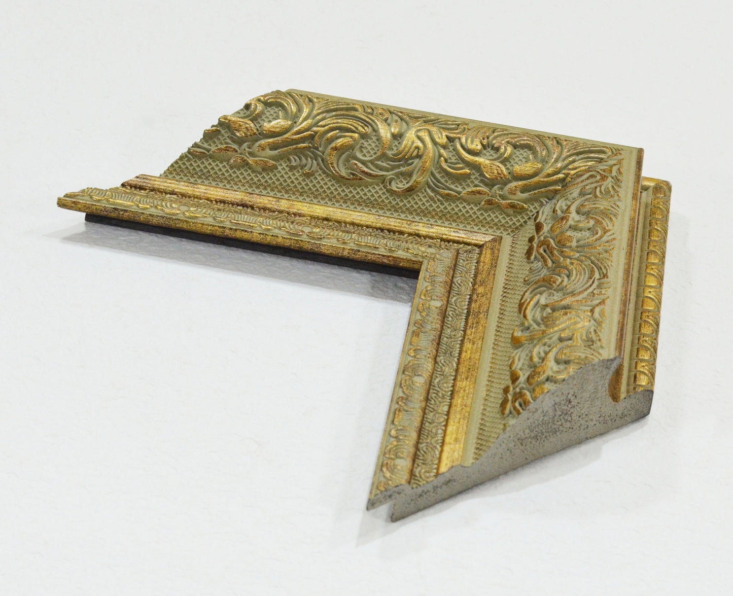 Antique Gold on Beige Green Background, Picture Frame. Width 3.74 inches, height 1.43 inches.