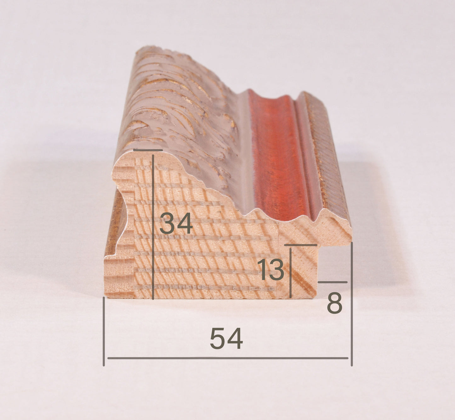 Antique gold picture frame on grey pink background with red stripe in classic style. 2.13" wide x 1.34" high.