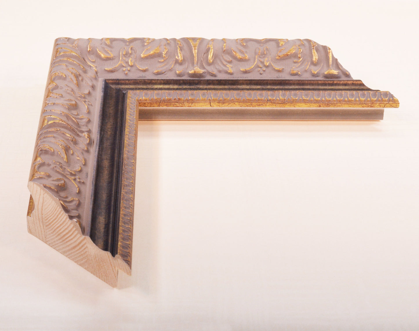 Antique Gold Picture Frame on rich gray background with black stripe in classic style. Width 2.13" x Height 1.34".