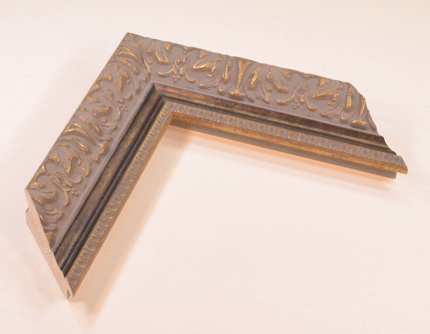 Antique Gold Picture Frame on rich gray background with black stripe in classic style. Width 2.13" x Height 1.34".