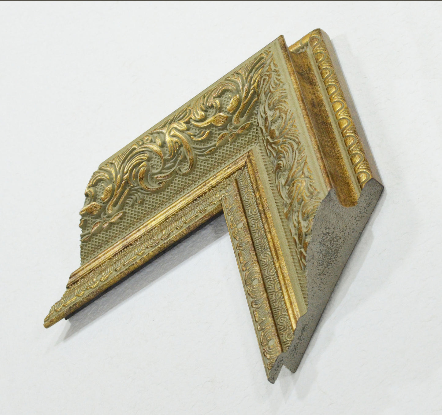 Antique Gold on Beige Green Background, Picture Frame. Width 3.74 inches, height 1.43 inches.