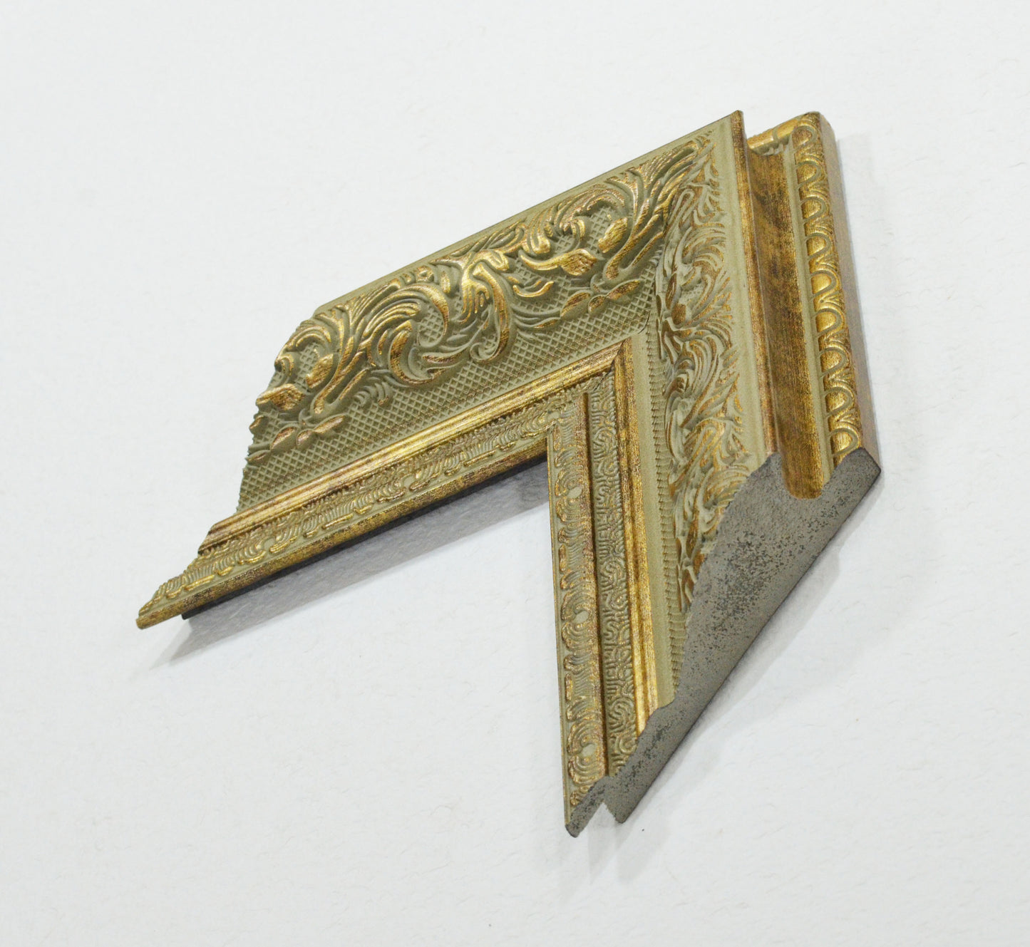 Antique Gold on Beige Green Background, Picture Frame. Width 3.74 inches, height 1.43 inches.
