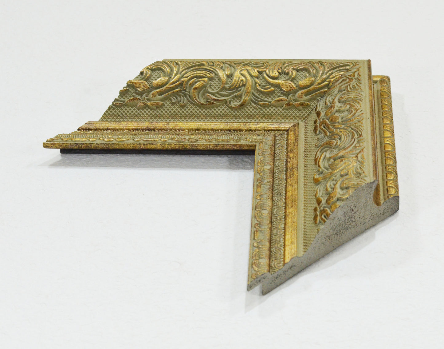 Antique Gold on Beige Green Background, Picture Frame. Width 3.74 inches, height 1.43 inches.
