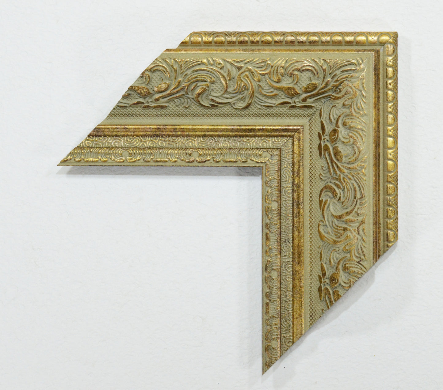 Antique Gold on Beige Green Background, Picture Frame. Width 3.74 inches, height 1.43 inches.